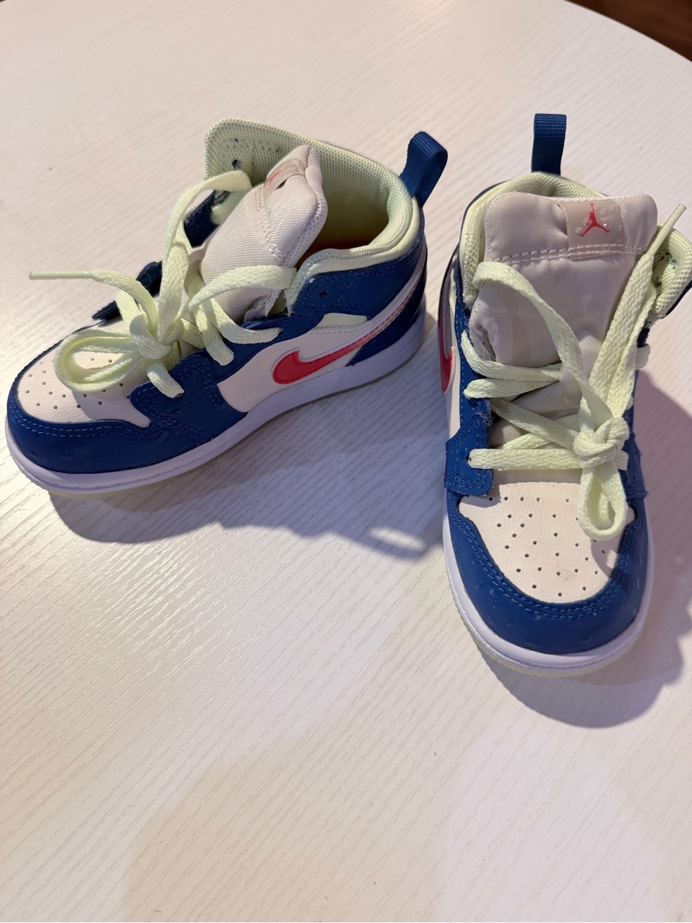 Nike Kids Blue and White High-Top Sneakers with Pink Swoosh